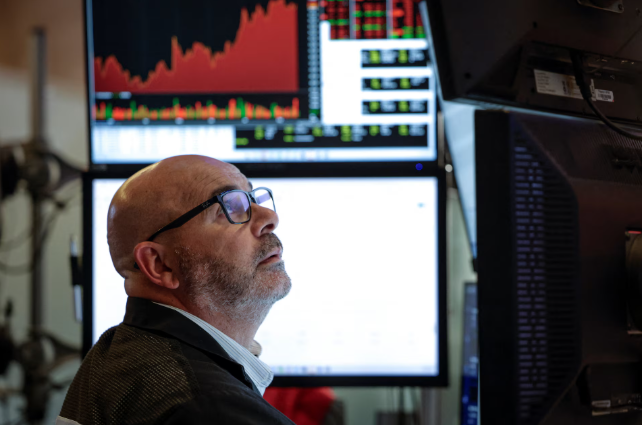 Wall St rises as yields ease