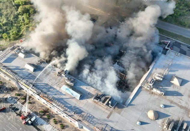 Firefighters work at the site of a shopping mall hit by Russian drone strikes in Kryvyi Rih, Ukraine