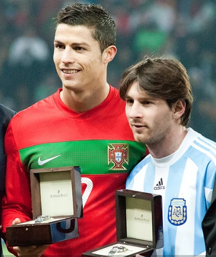 Messi has been compared with Cristiano Ronaldo (left) throughout much of their careers.