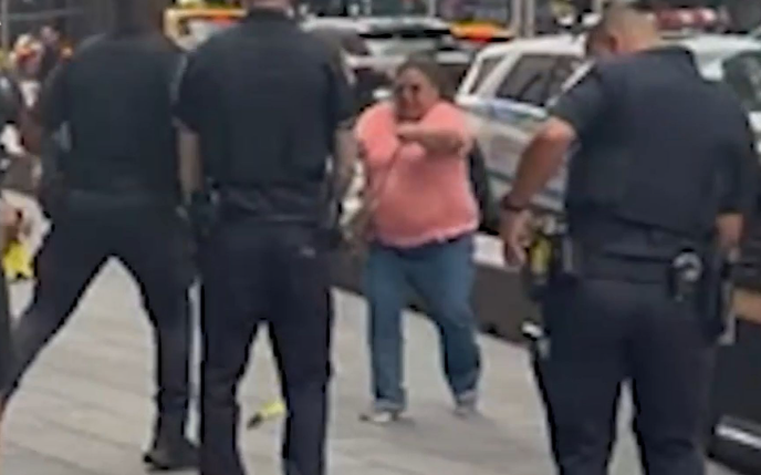 Woman stabs 2 people in New York City's Times Square, killing 1, then is killed by police