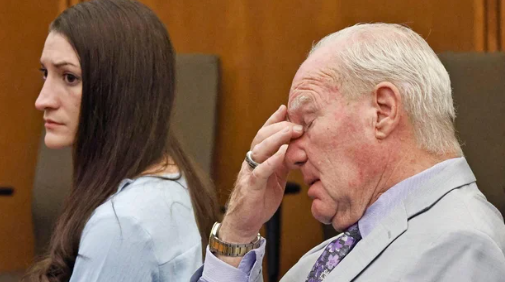 Lindsay Clancy and attorney Kevin Reddington watch as Judge William Sullivan