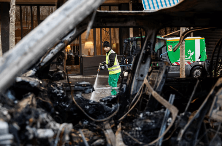 Police arrested thousands as rioters looted shops, damaged buildings, and clashed with officers in several cities.
